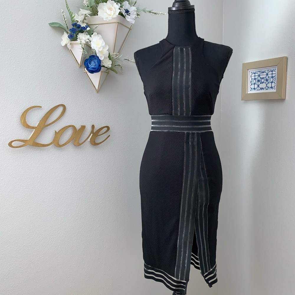Black dress with side slit. New.